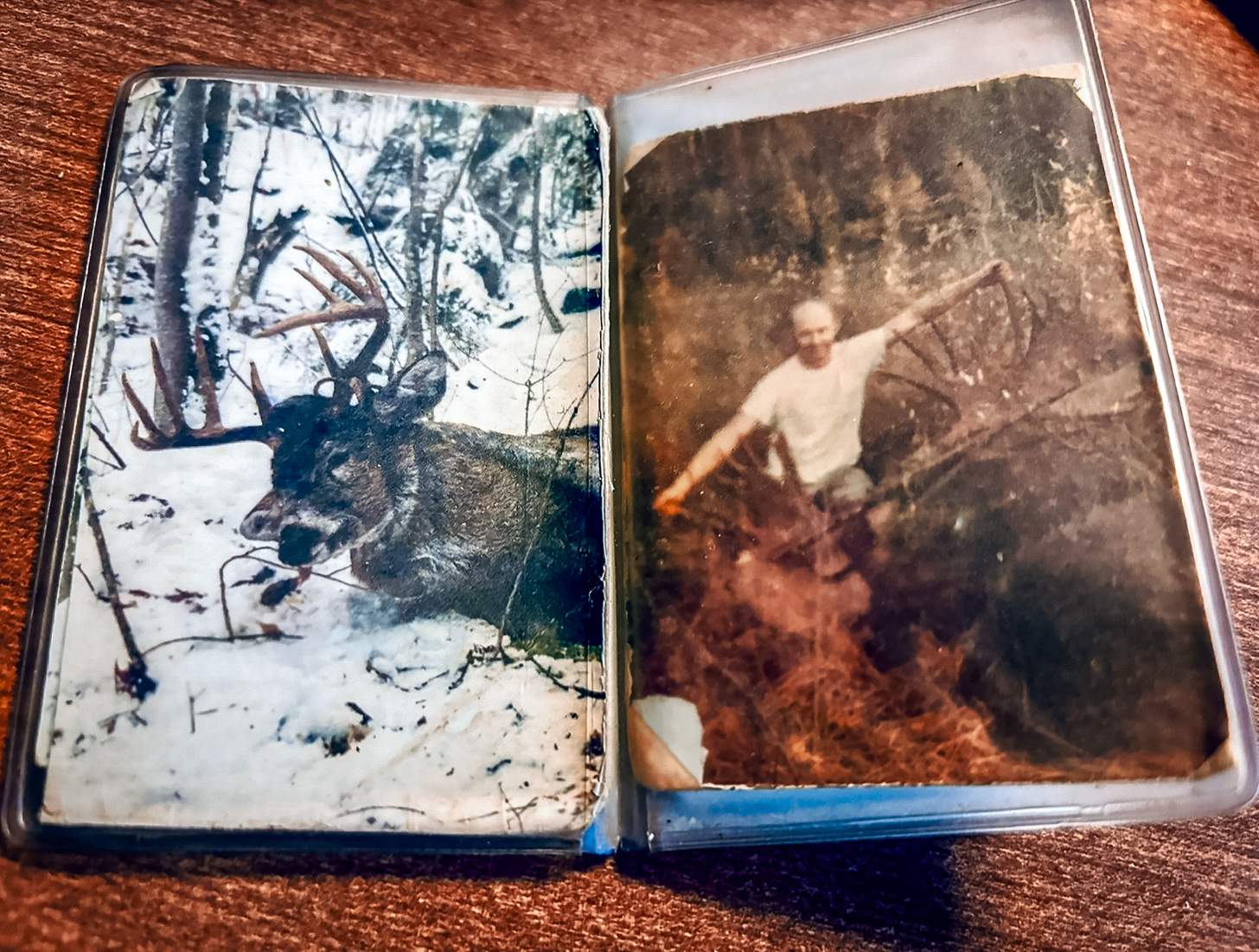 Ed Hall's hunting photo book full of tattered snapshots