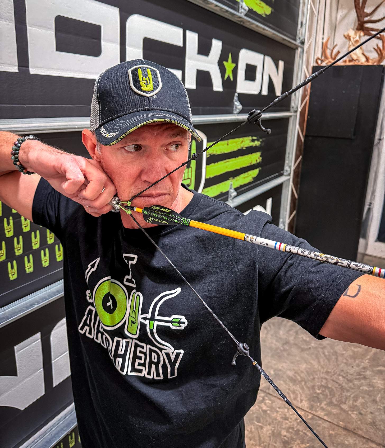 John Dudley at full draw in the Nock On indoor range