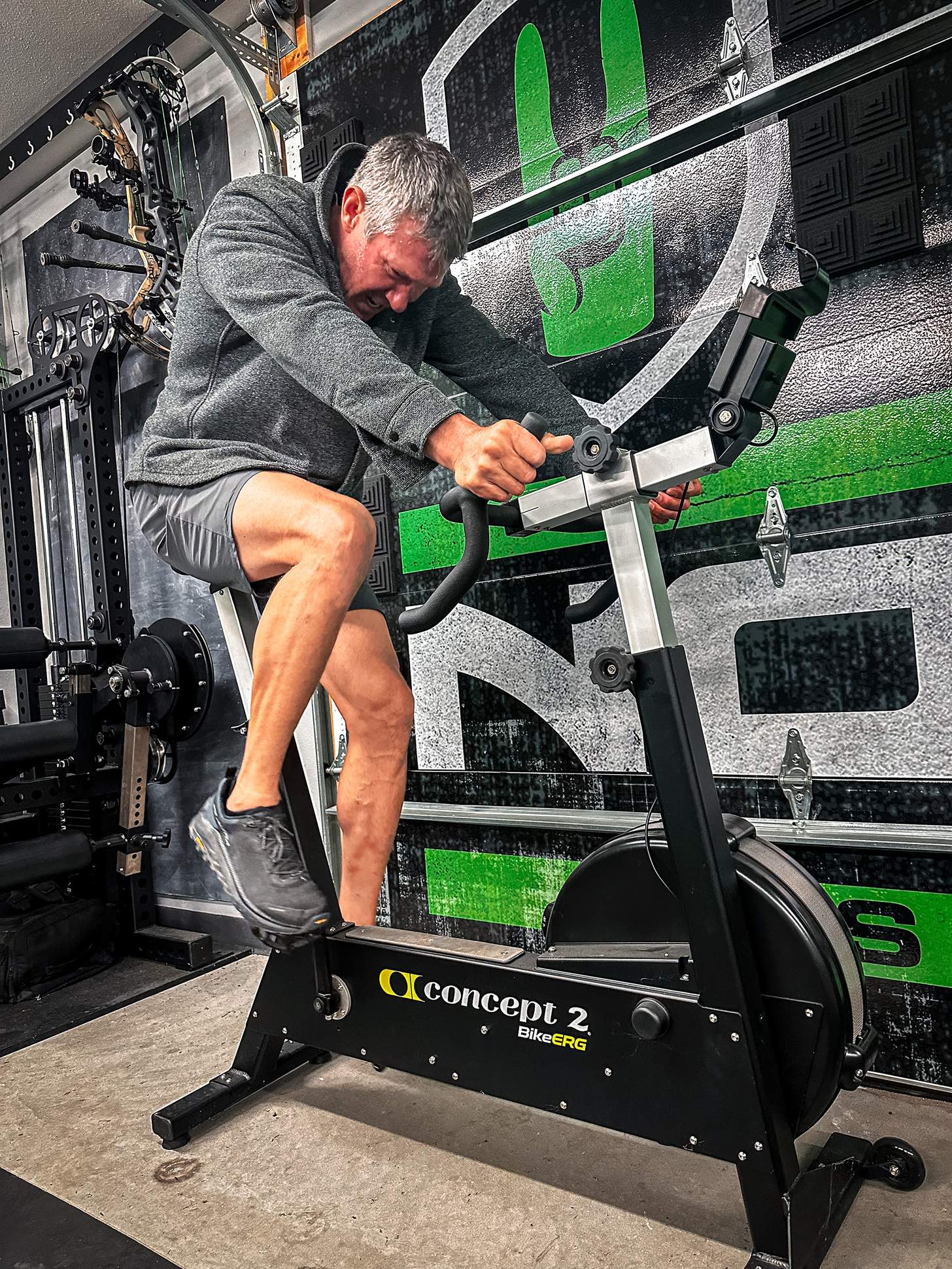 John Dudley on a stationary bike in the gym