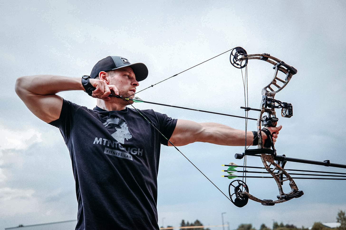 an archer at full draw