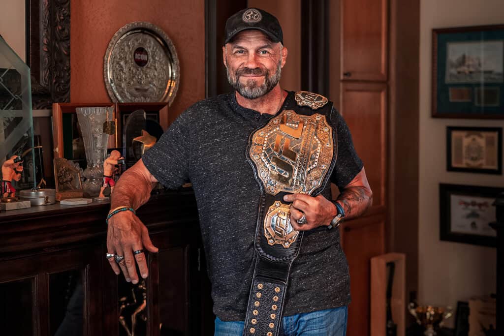 randy couture with his UFC championship belt