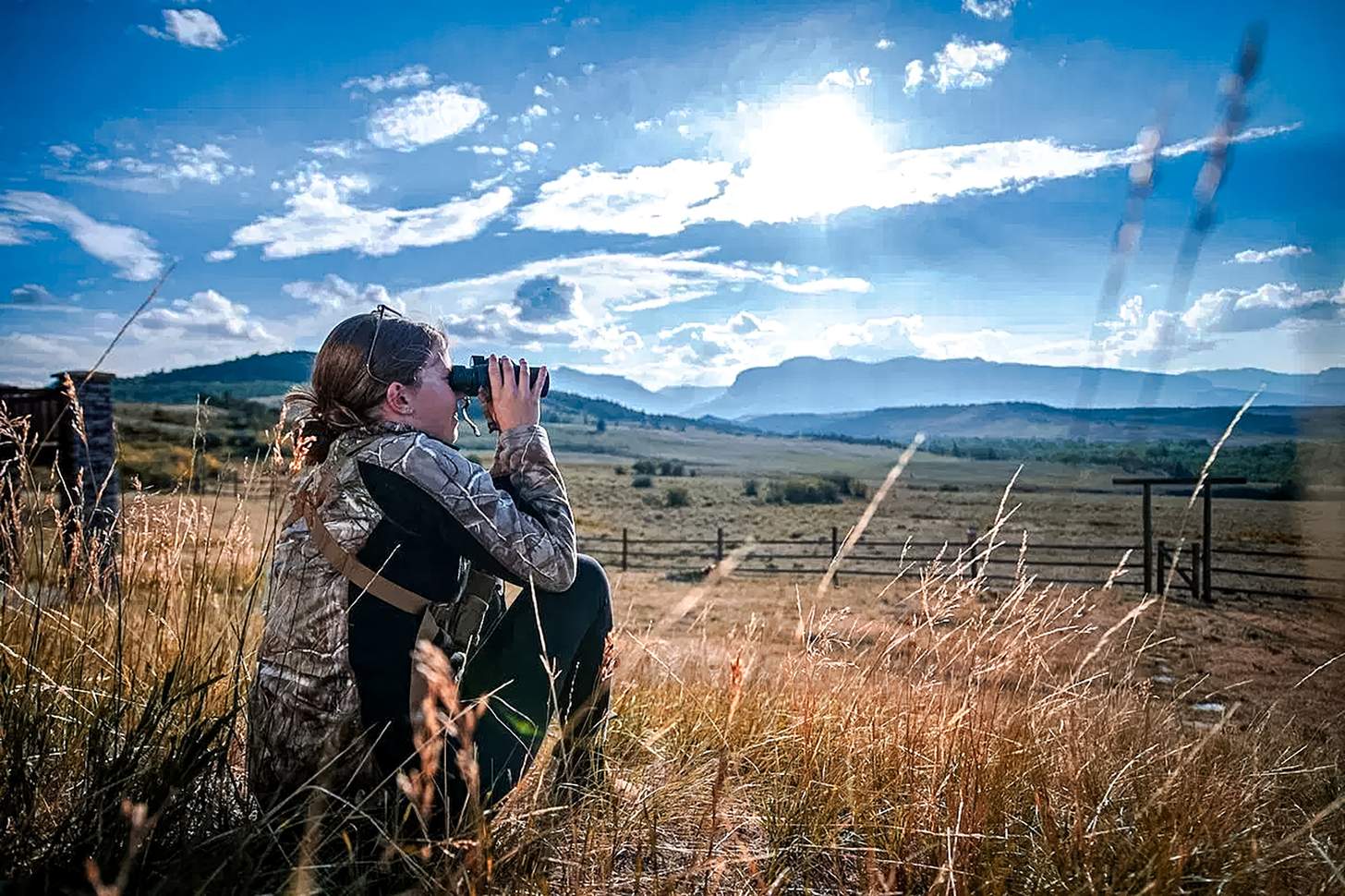 A UM student looks through the scope of a hunting rifle as part of the W.A. Franke College of Forestry and Conservation’s Wild Sustenance course near Dupuyer. Photo: UM