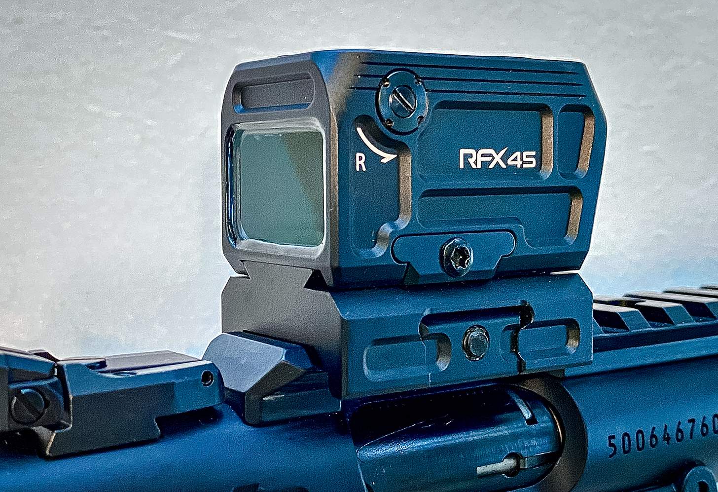 a close-up of the Viridian RFX 45 reflex sight mounted on the Ruger Mark IV 22/45 Lite