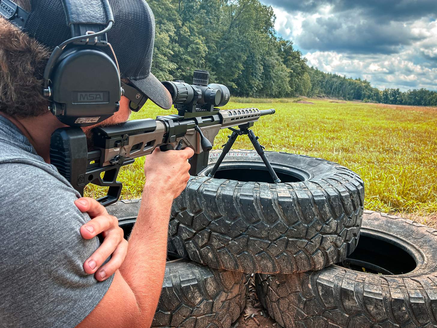 shooting from a bipod on a tire obstacle