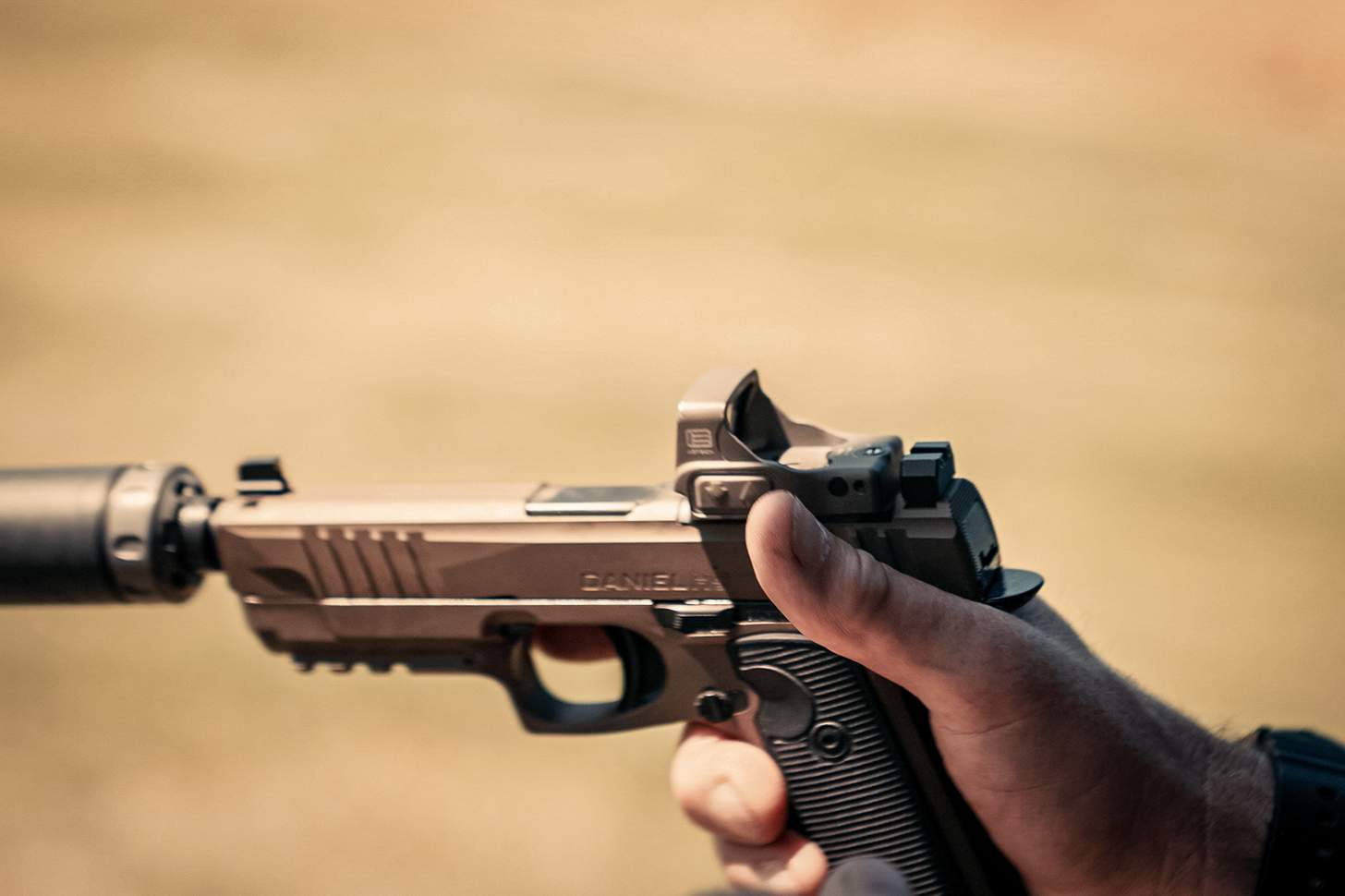 A Daniel Defense H9 pistol outfitted with an EOTECH EFLX Mini Red Dot Sight.  