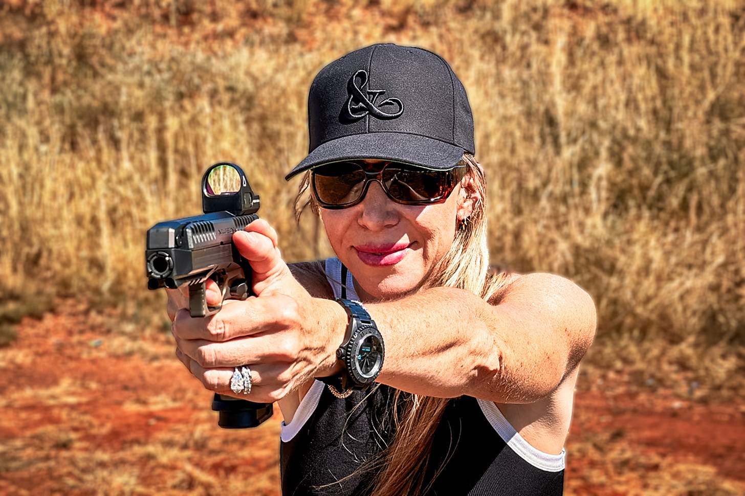 the author shooting the Laugo Alien pistol