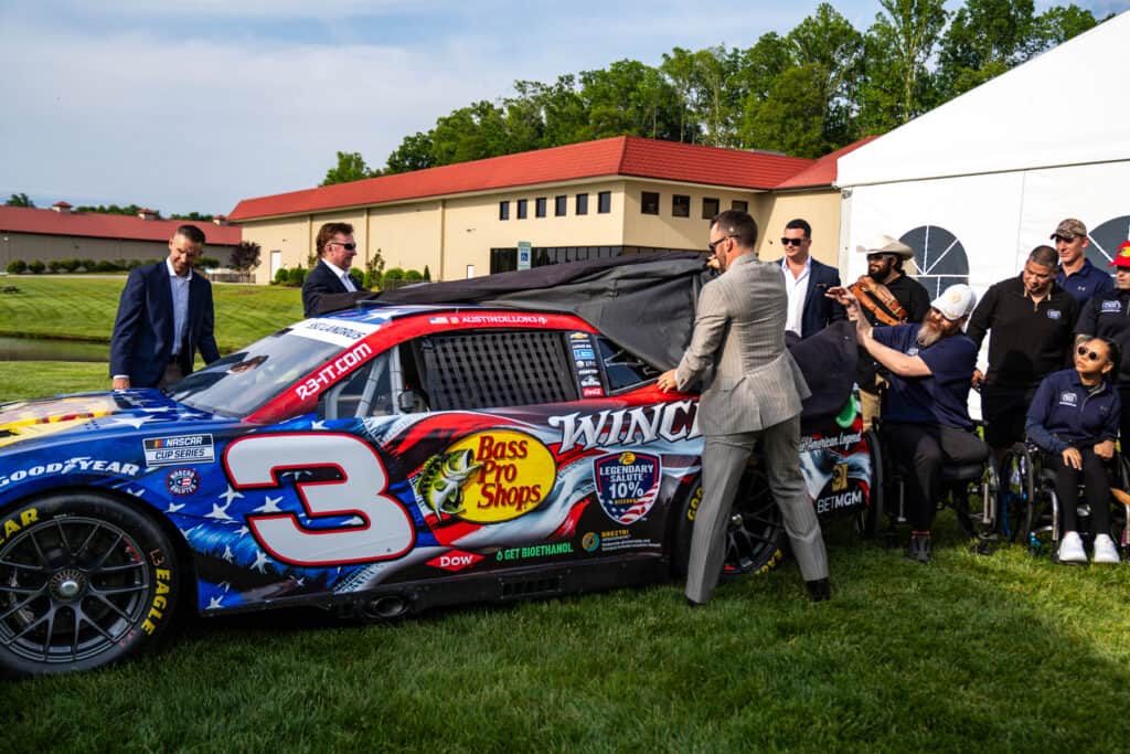 Austin Dillon unveils the patriotic Winchester-Bass Pro Shops beast.