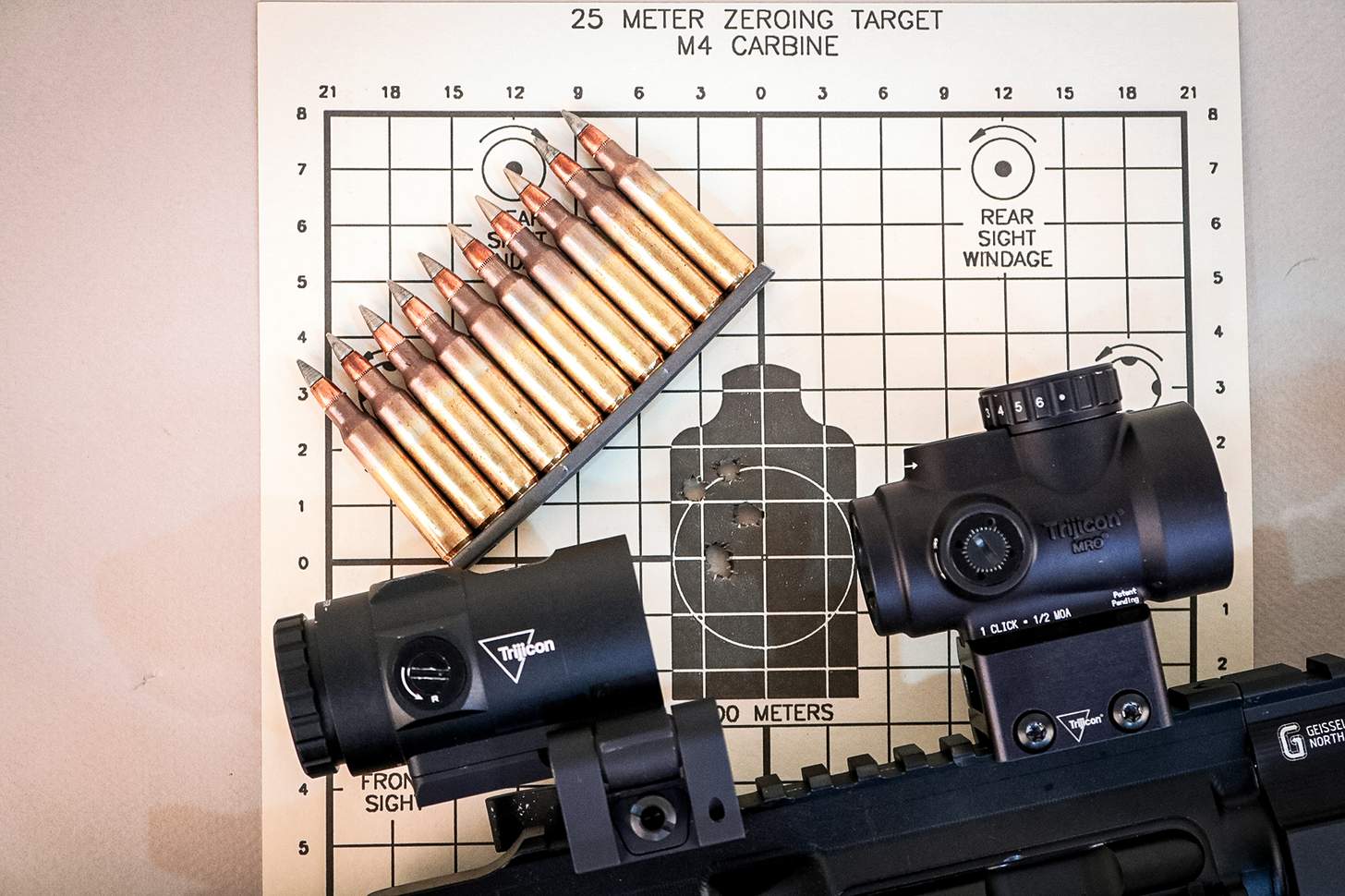 Trijicon MRO SD with magnifier on an AR with ammo in a stripper clip