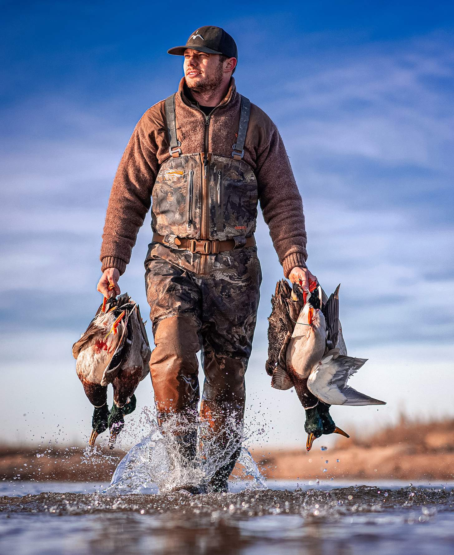 Drew McIntosh of Migra Ammunition with mallards