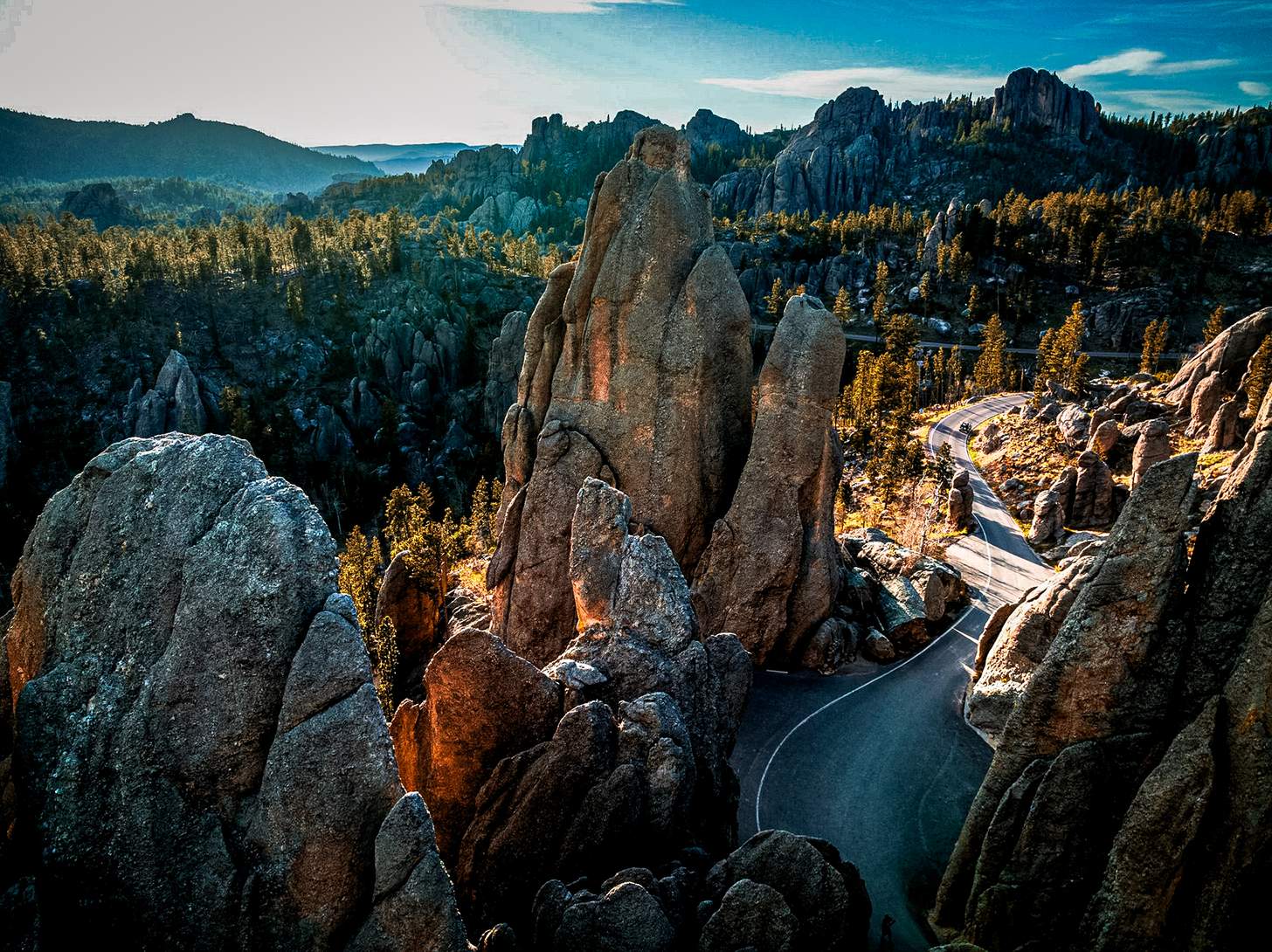road cutting through mountains