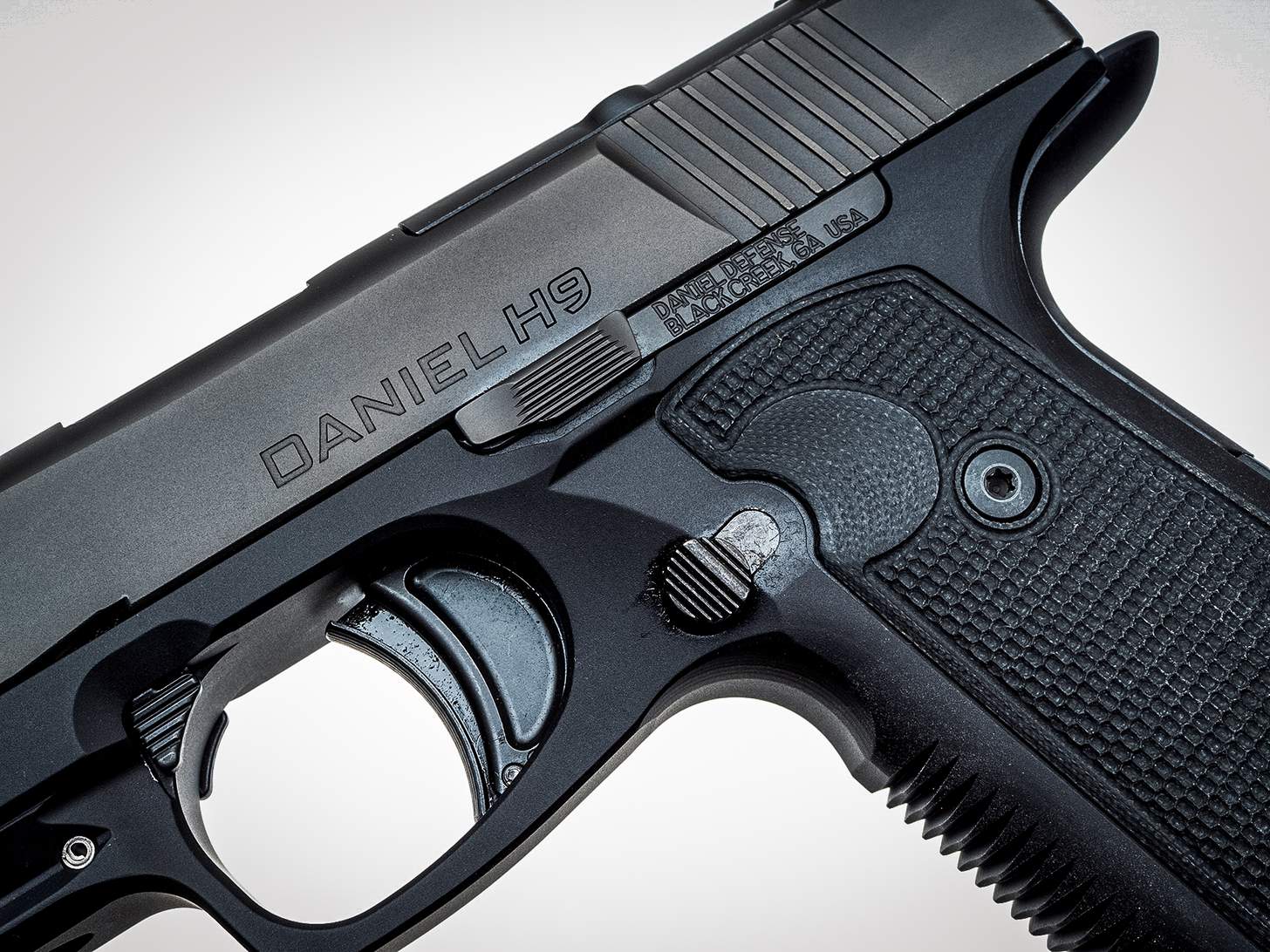 the slide lock, mag release, and trigger