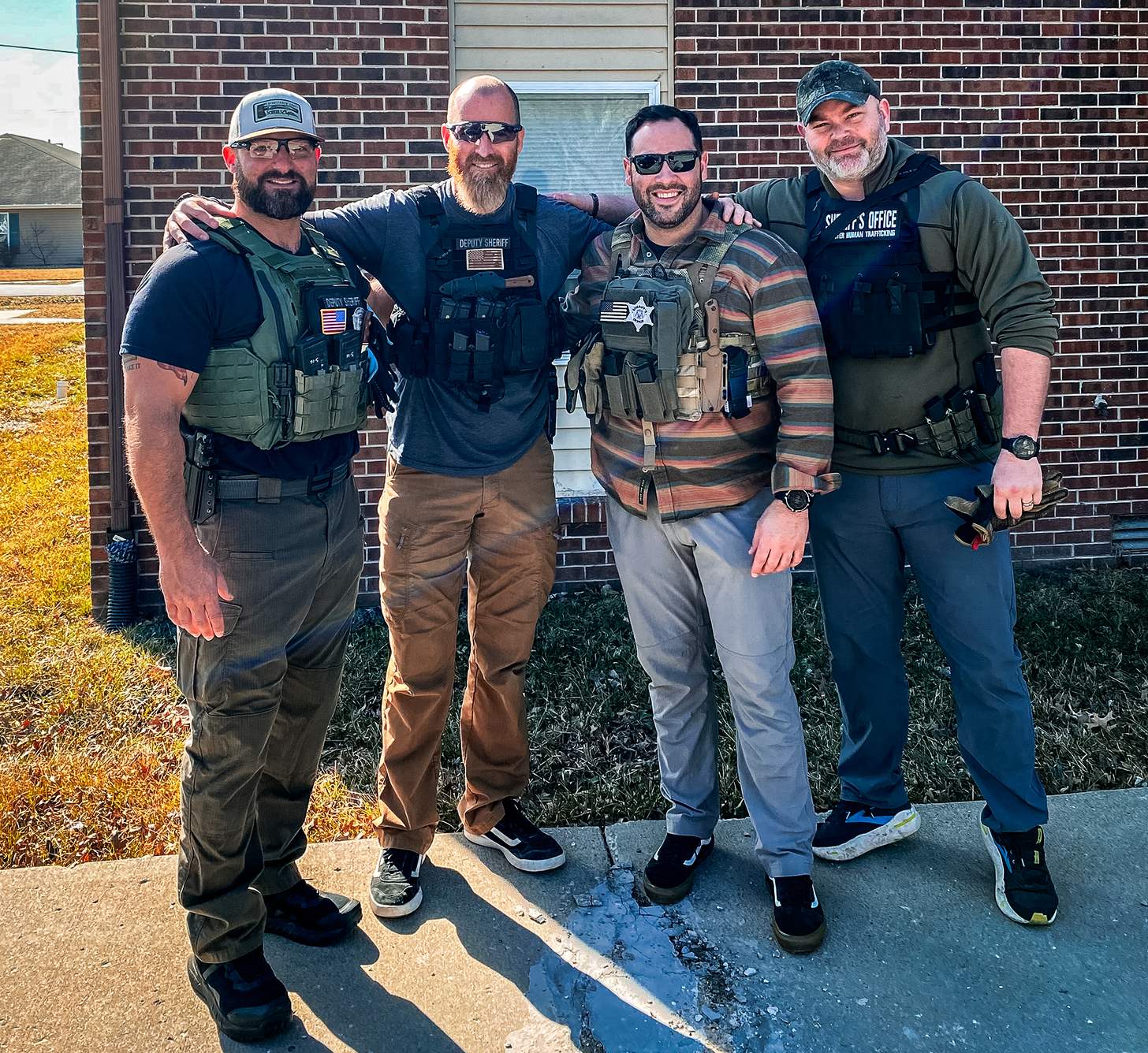 Adam Laroche with law enforcement personnel