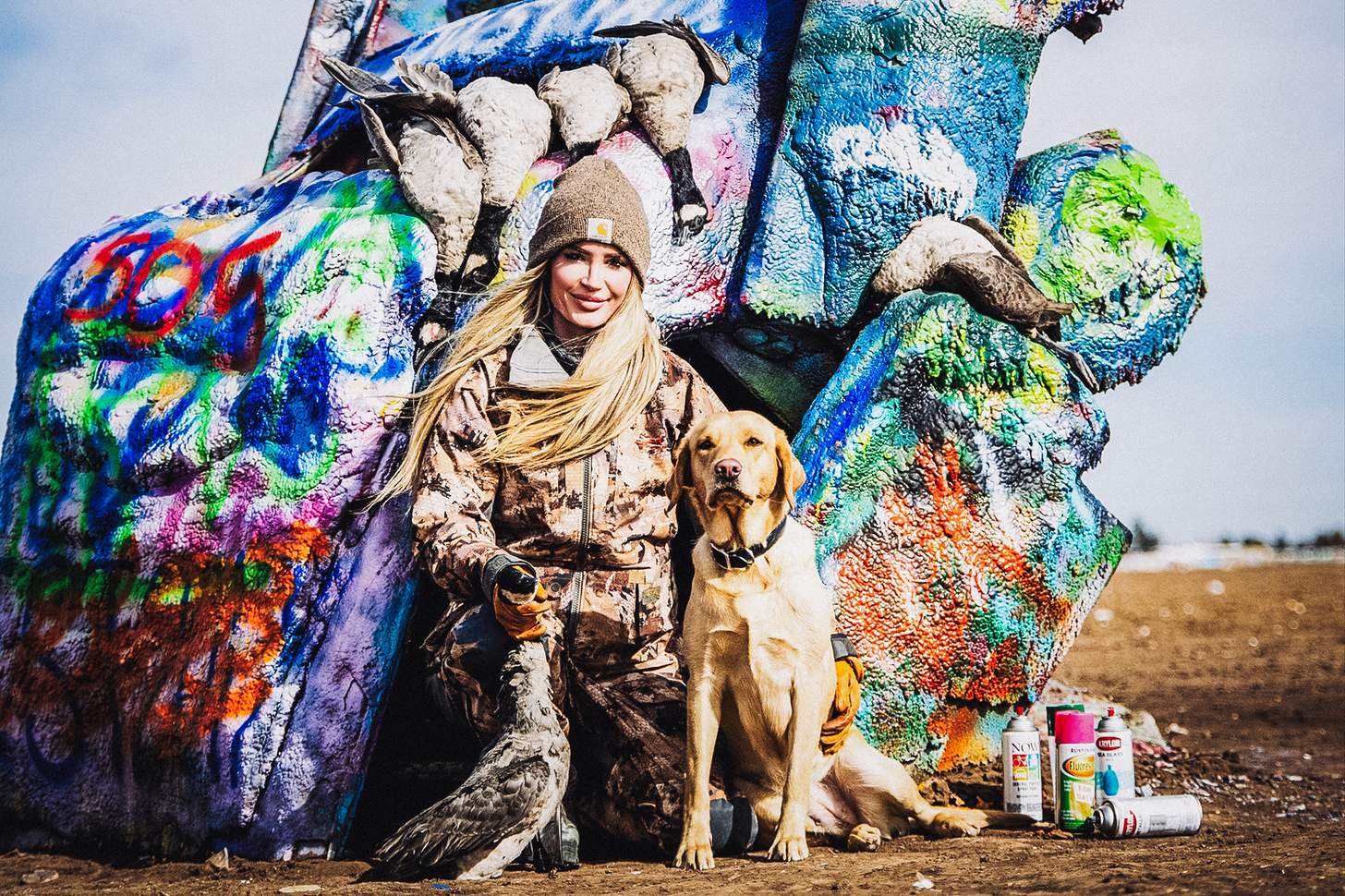 lauren brown with a duck and her dog