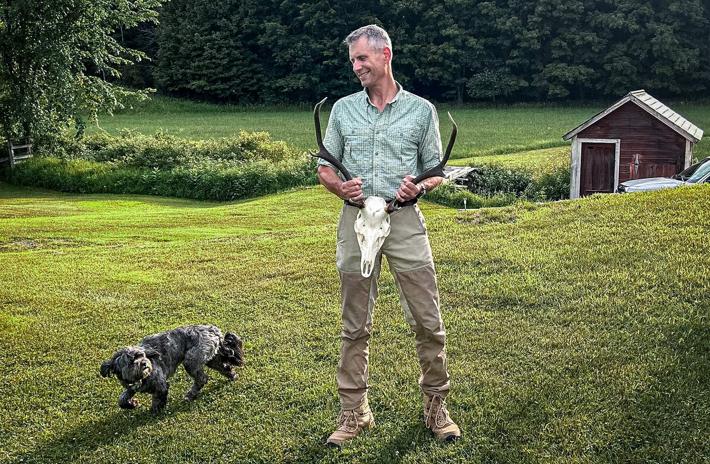Steve Oster holding a deer skull