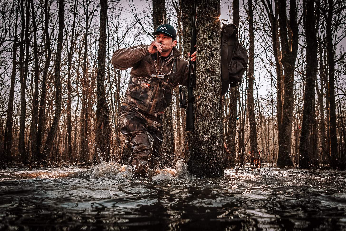 Drew McIntosh of Migra Ammunition calling in the flooded timber