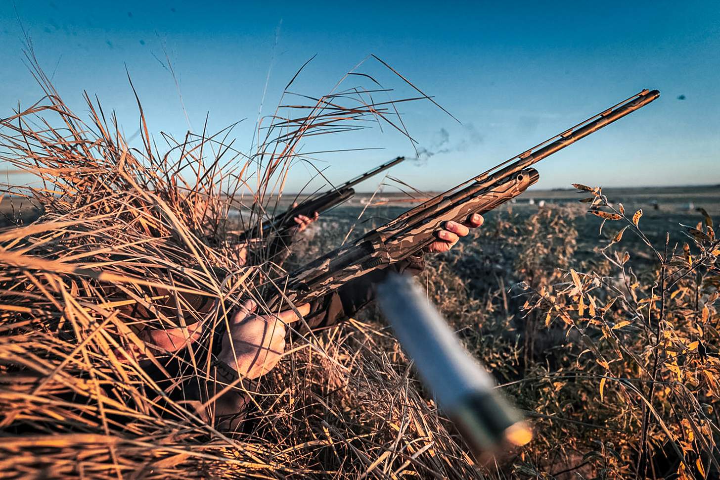 Beretta AX800 Suprema firing in a duck blind