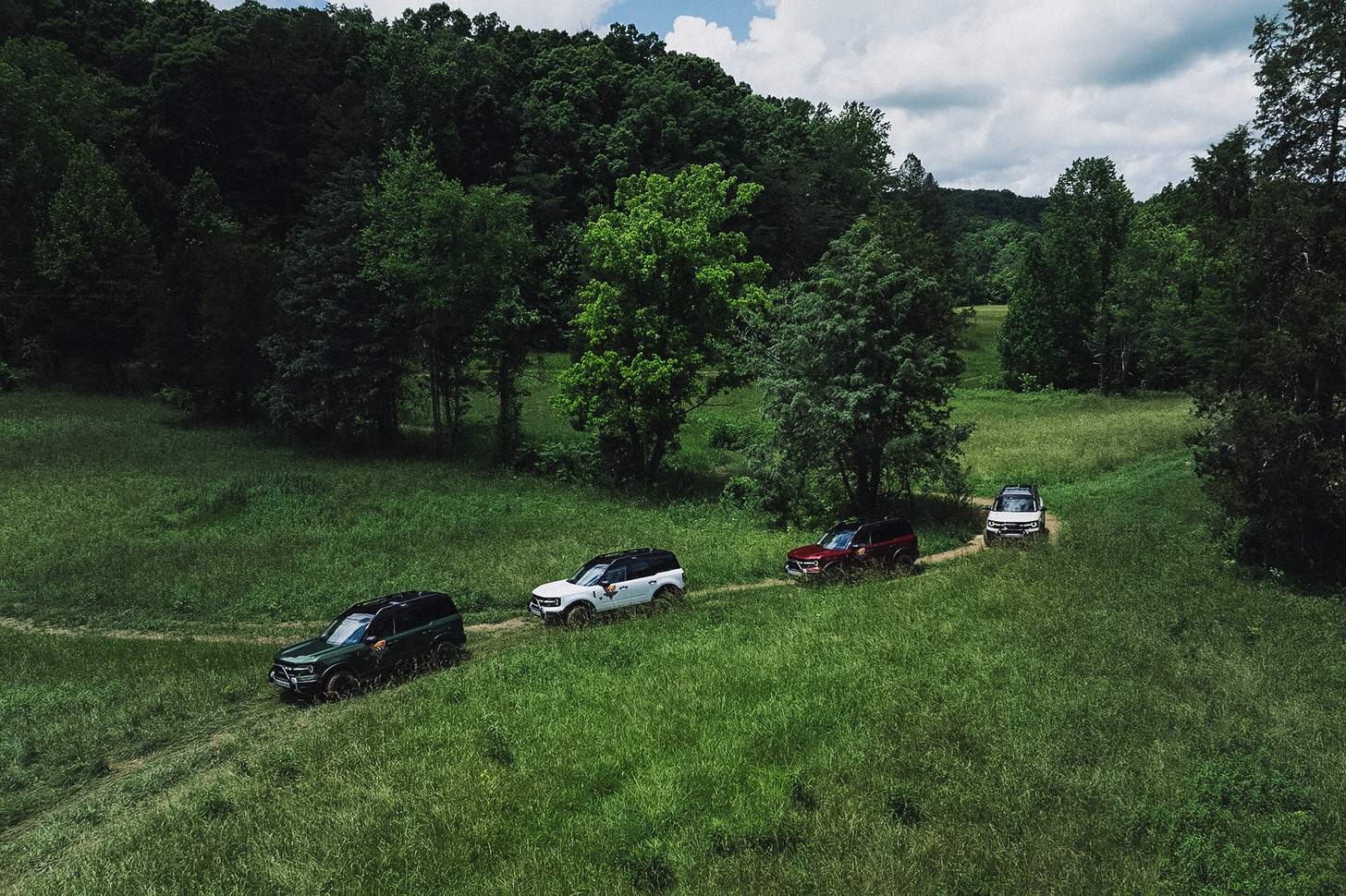 Ford Broncos driving off road