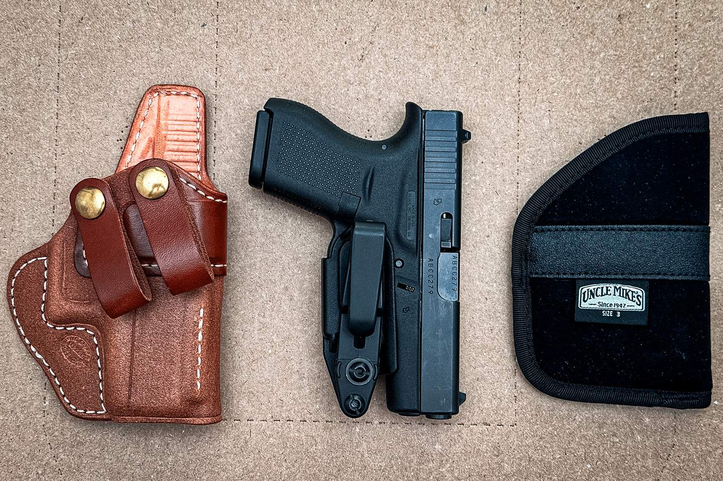 Glock 42 with a clip holster, leather, and pocket holster
