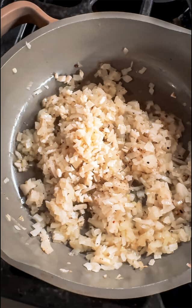 frying onions in a pan