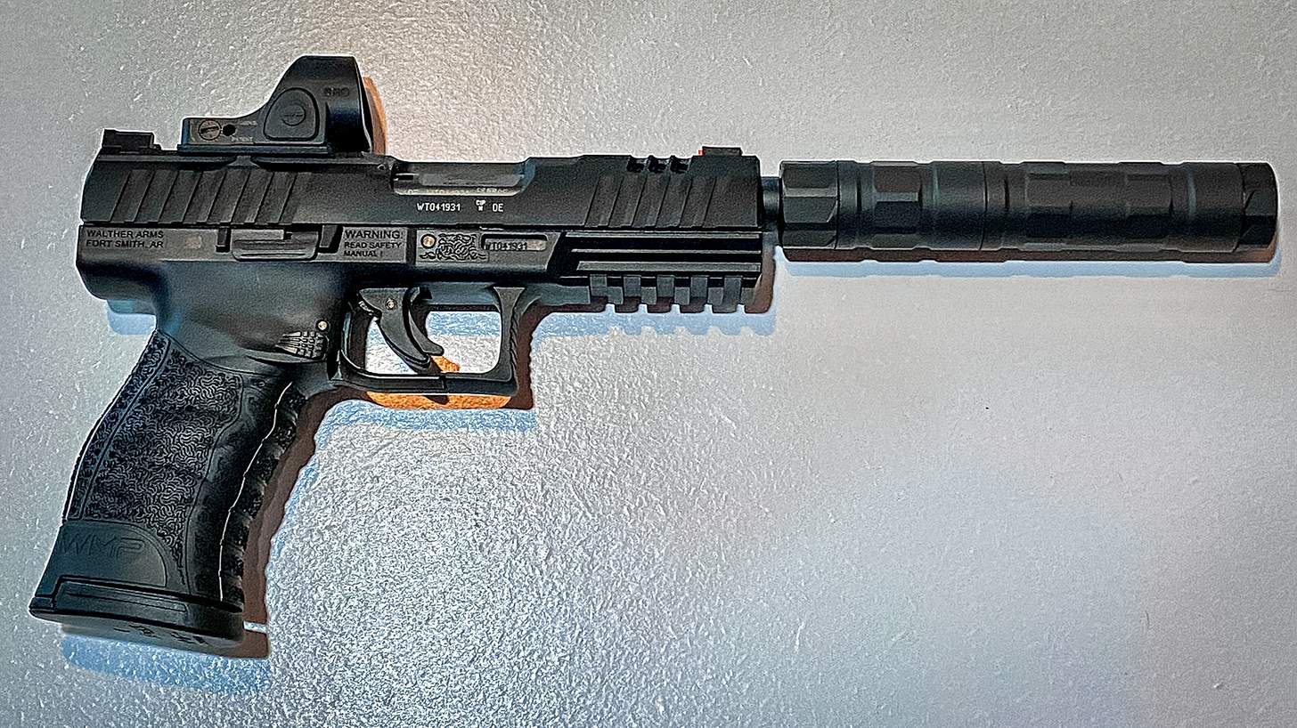 Walther WMP SD pistol with a Trijicon SRO red dot and a SilencerCO Switchback Suppressor