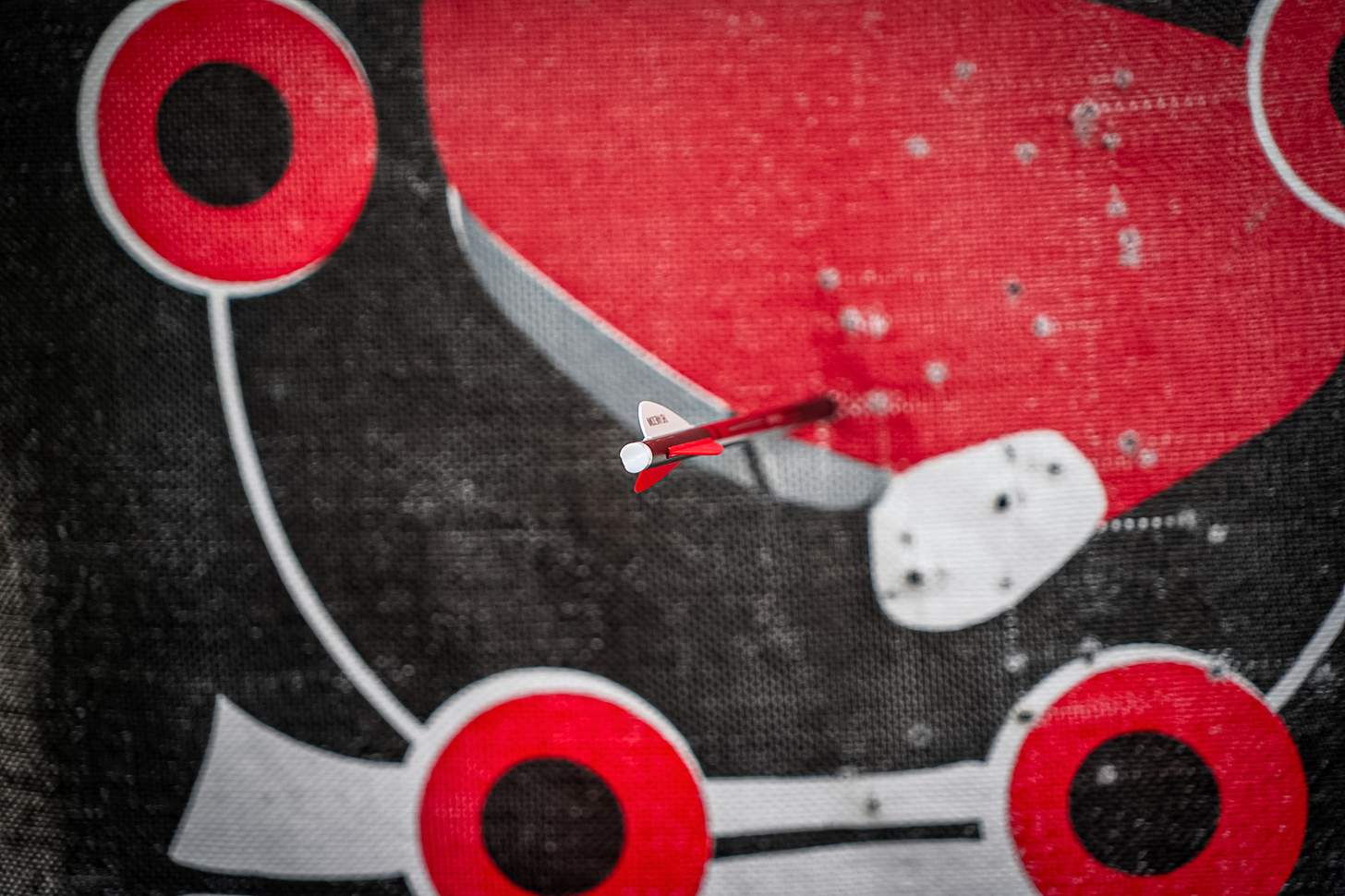 a crossbow bolt in a bag target