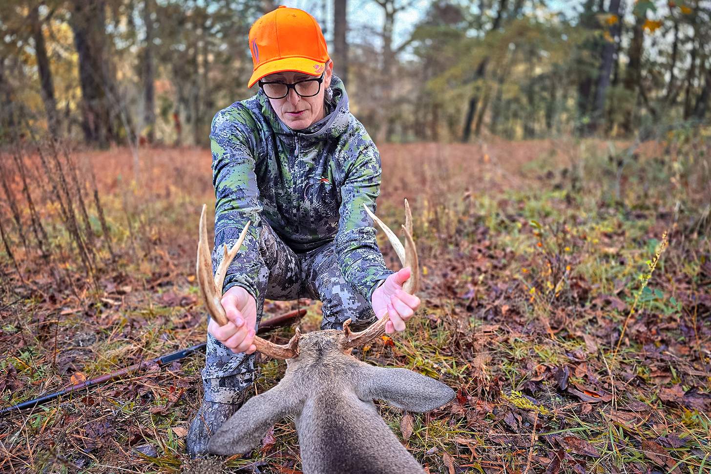 a hunter with a buck