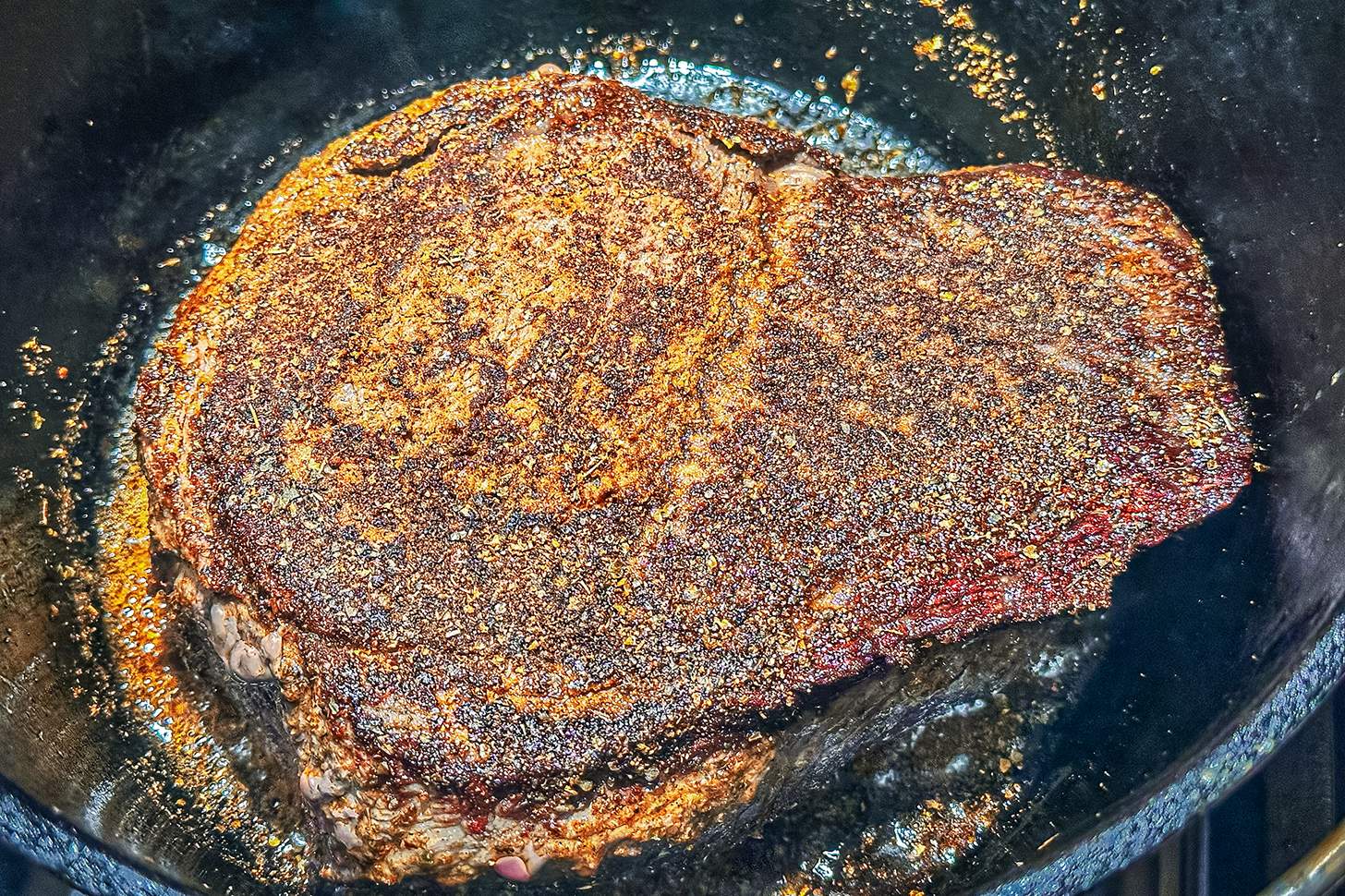 moose pot roast cooking in cast iron
