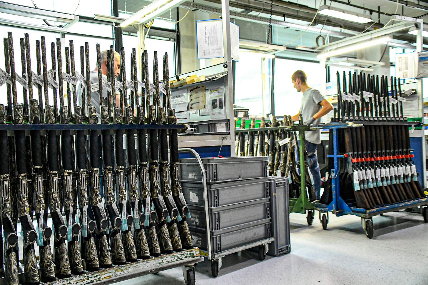 Beretta shotguns lined up in factory