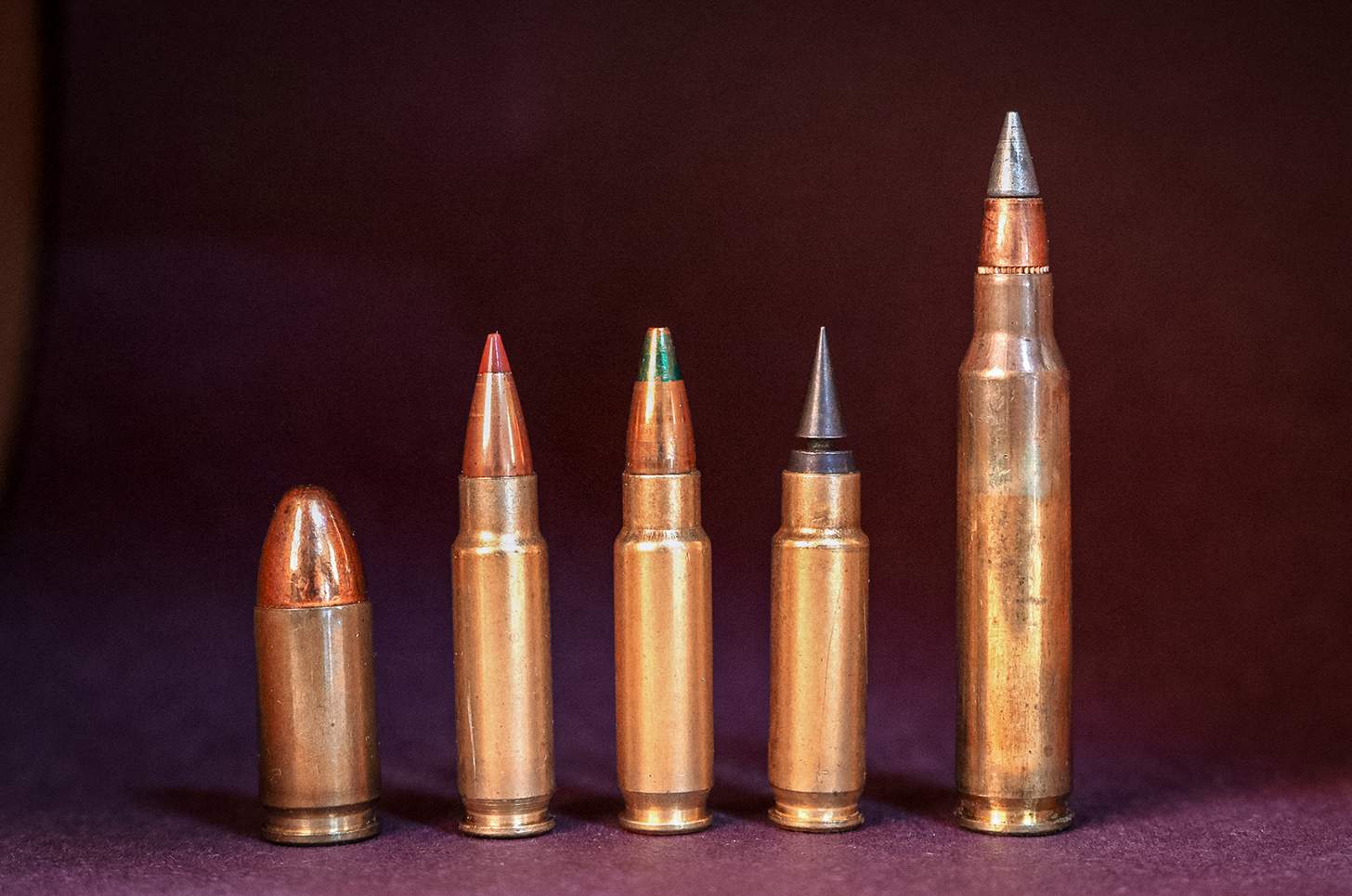 5.7mm cartridges with a 9mm and a .223