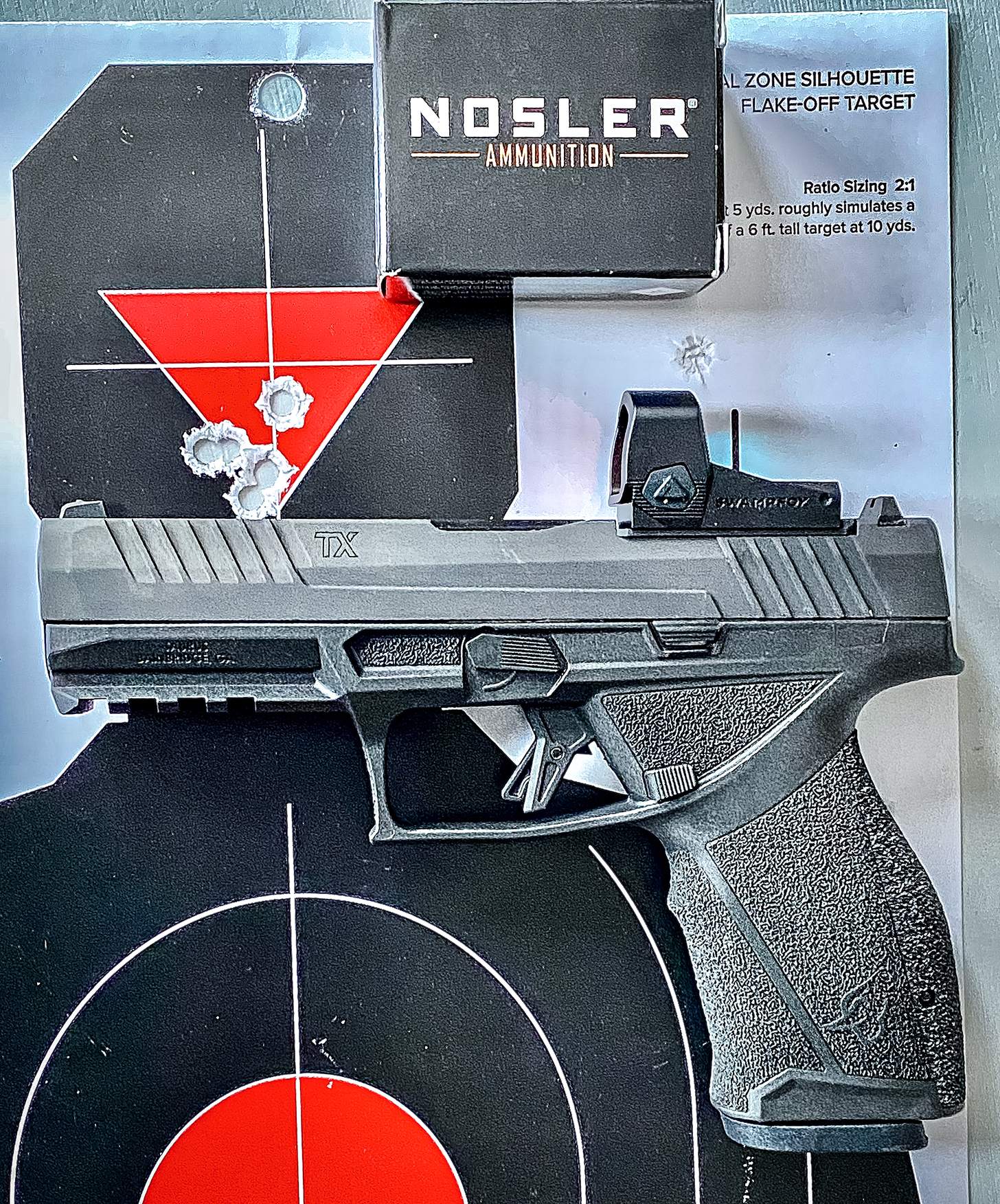 Taurus TX9 Full Size with target and Nosler ammo