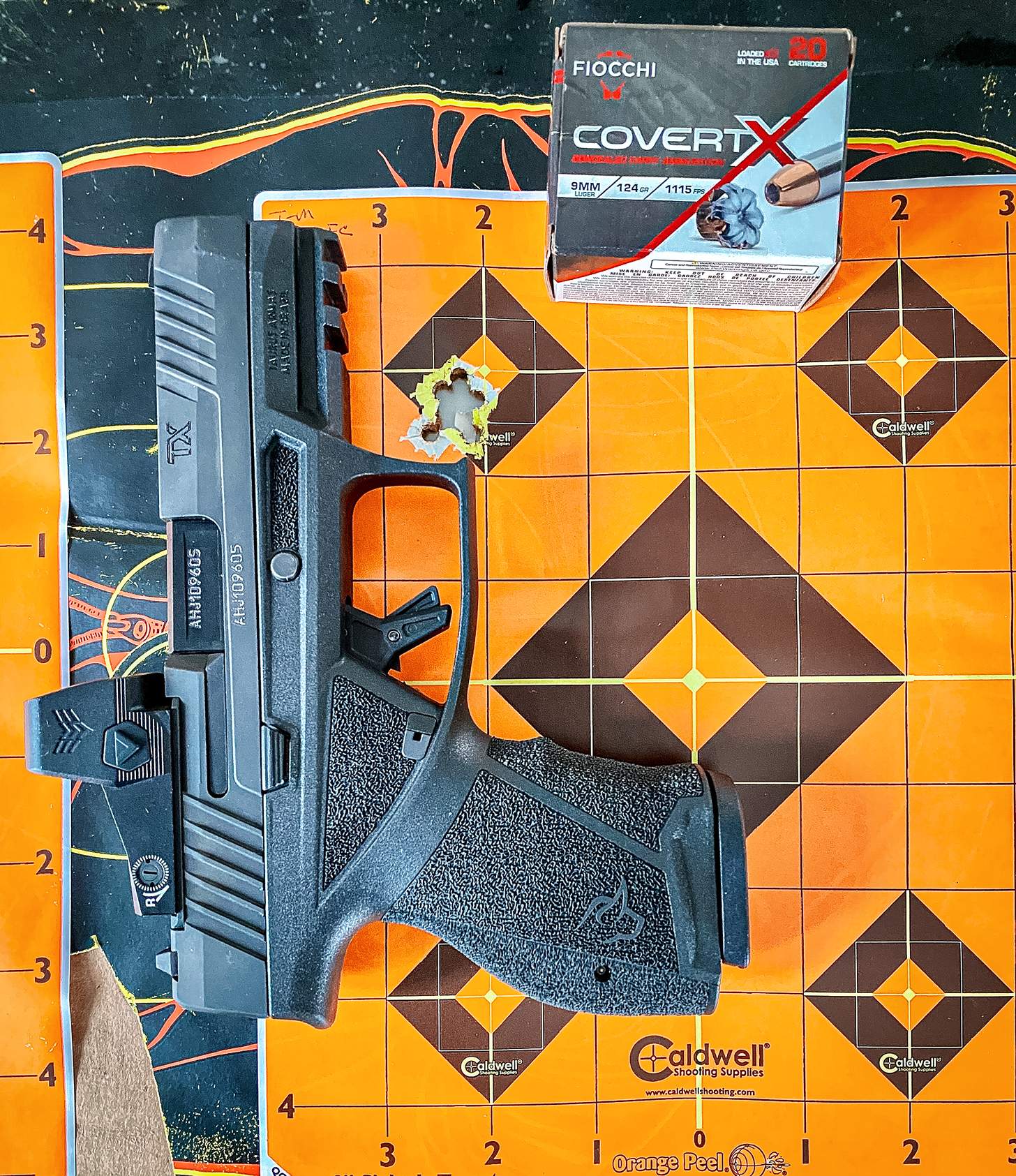 Taurus TX9 with target and Fiocchi CovertX ammo