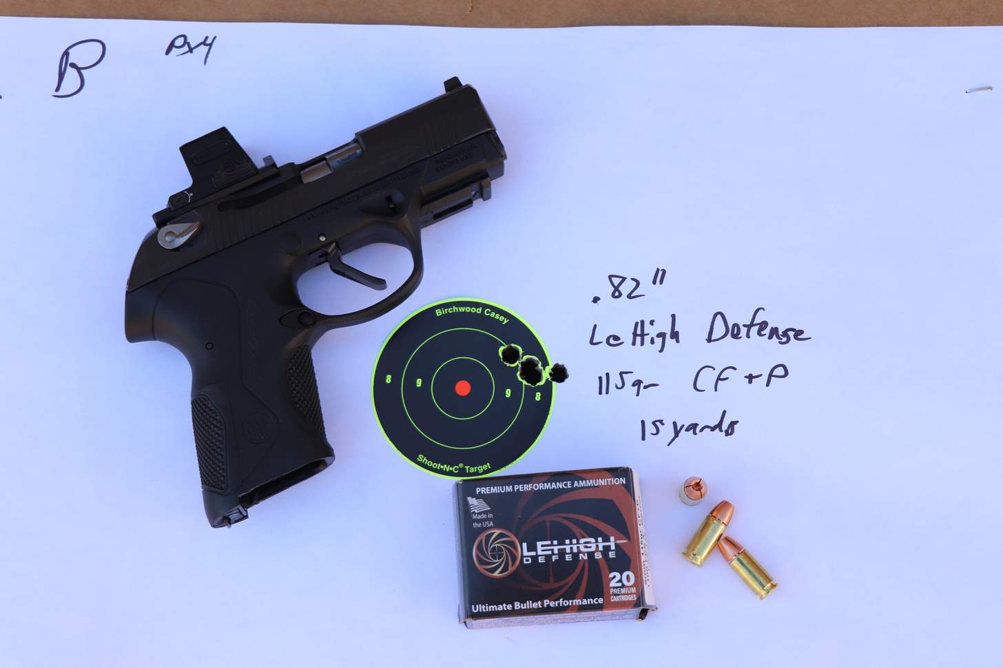 The Langdon Tactical Technology PX4 Compact Carry 2 sits with ammo on a paper target
