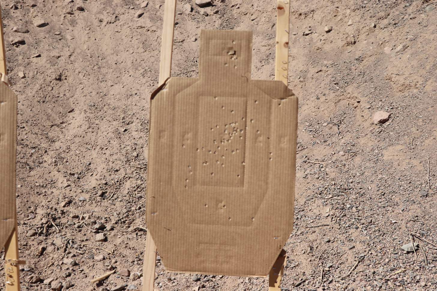 A silhouette target with holes