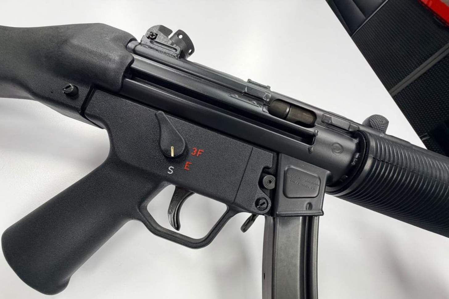 A closeup of the HK MP5SD fire control group.