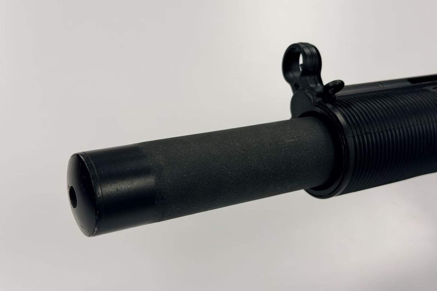 A closeup of the integrated suppressor on the HK MP5SD