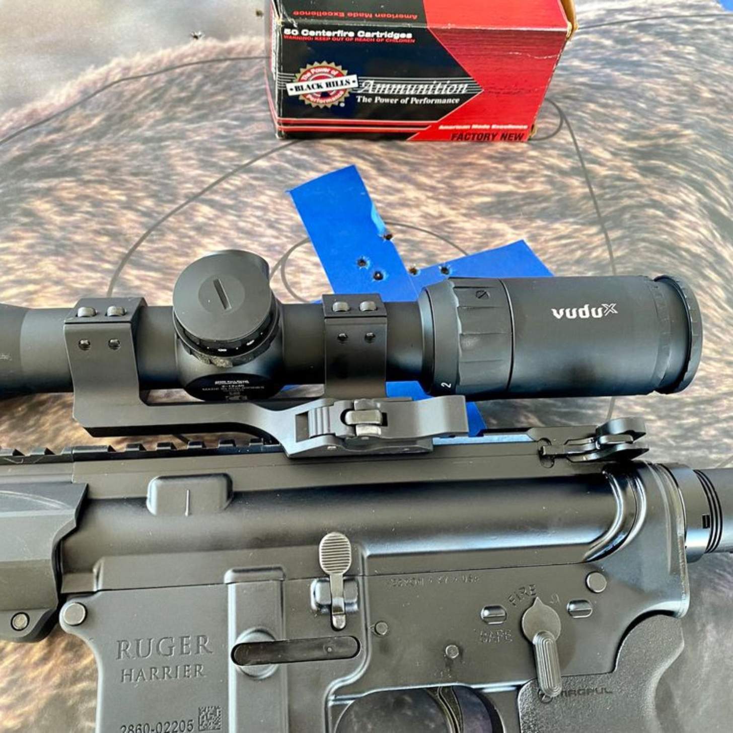 Ruger Harrier and a VuduX scope on a target with Black Hills ammo