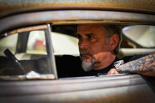 Richard Rawlings sitting in a car