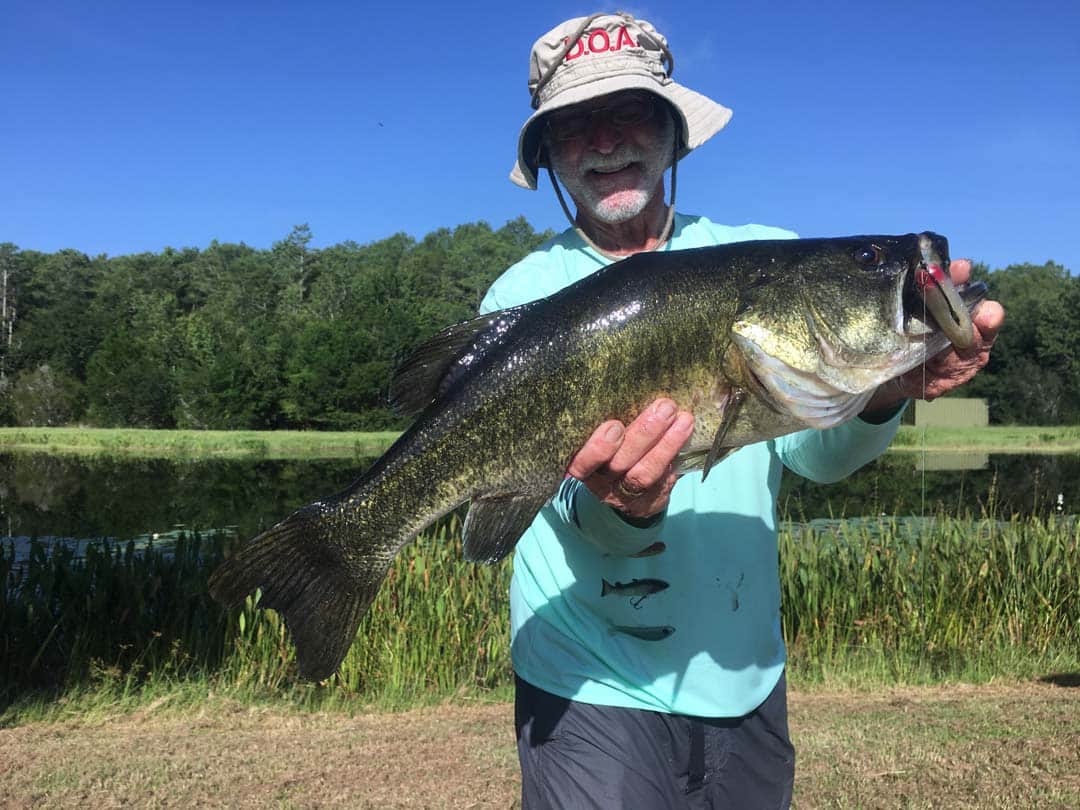 DOA Lures Founder Mark Nichols with a huge Florida bass caught at the Ritz Carlton