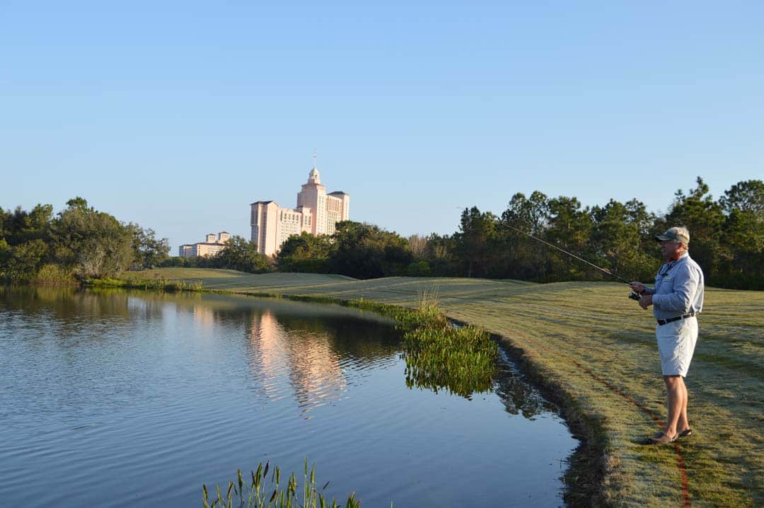 Guide Mark Benson fishing one of many trophy bass managed lakes at The Ritz-Carlton Orlando, Grande Lakes Resort