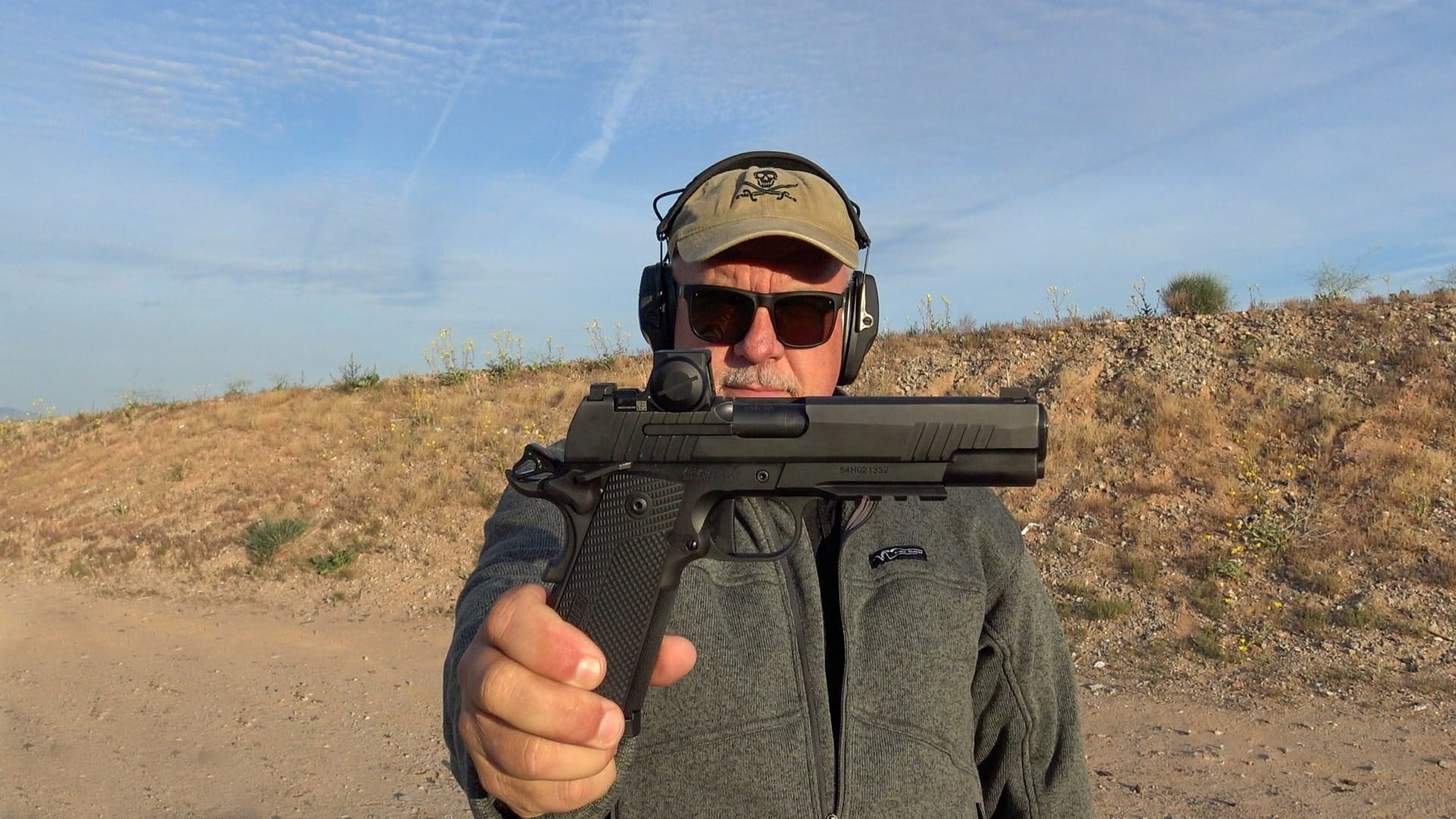 FRED MASTISON HOLDING SIG SAUER XFULL 1911X
