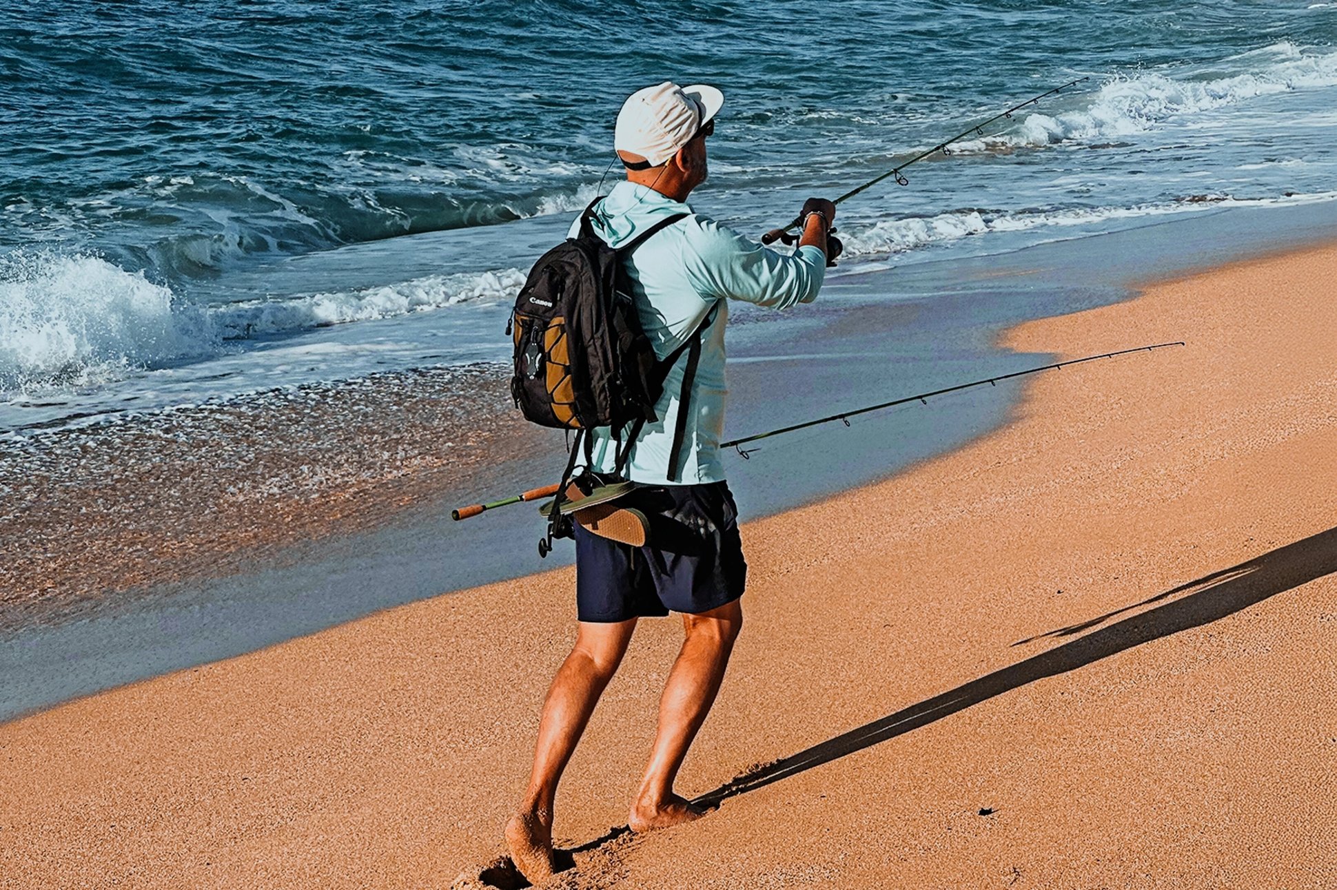 a man surfcasting on the run