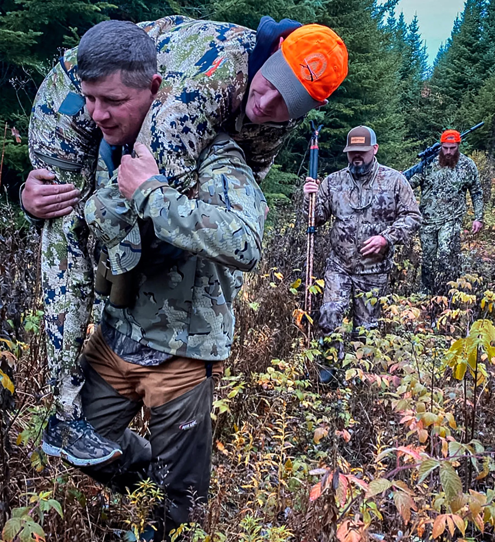 Johnny Joey Jones being carried by his hunting buddy. Jones' new book, Behind the Badge, hits stores today.