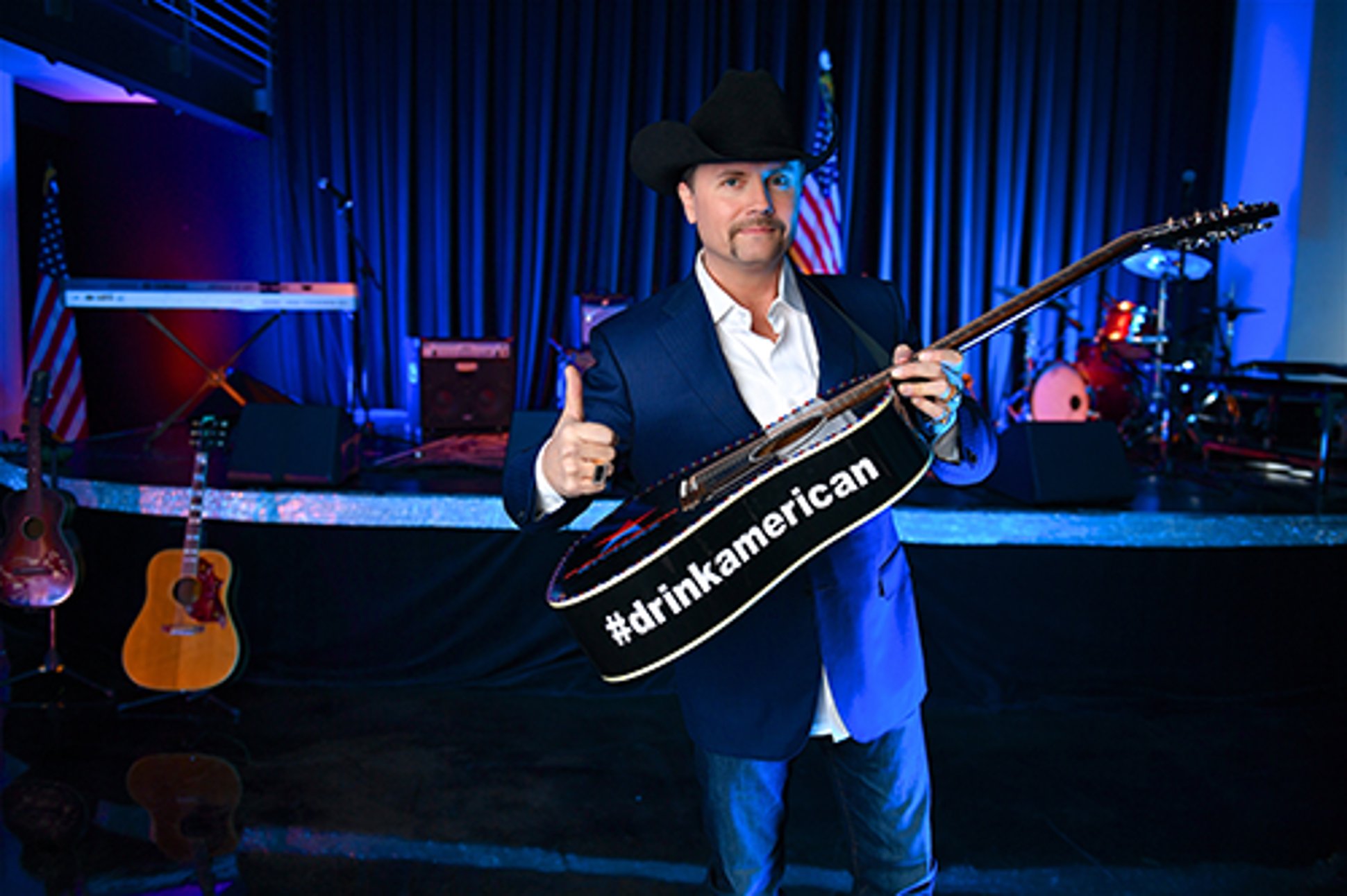 John Rich drink America guitarJohn Rich: Building His Rich Legacy
