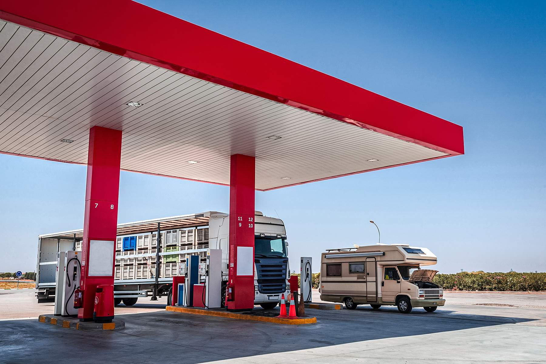 camper van at a rural gas station