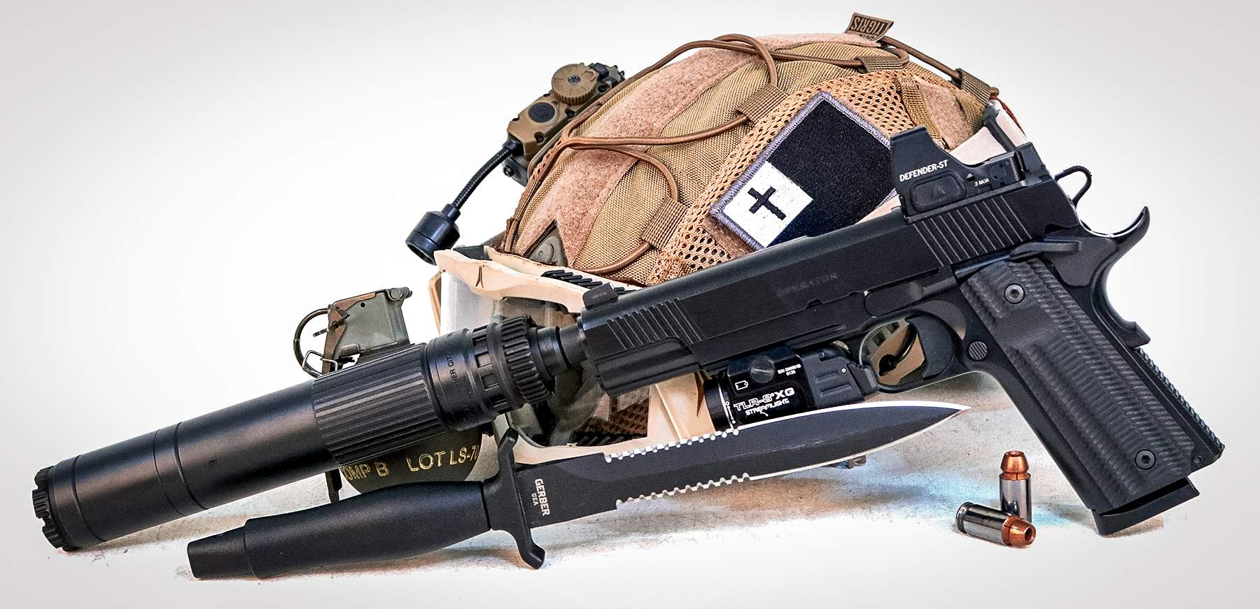 Springfield Operator and the dead air mojave 45 suppressor and a Gerber Mark II Commando knife