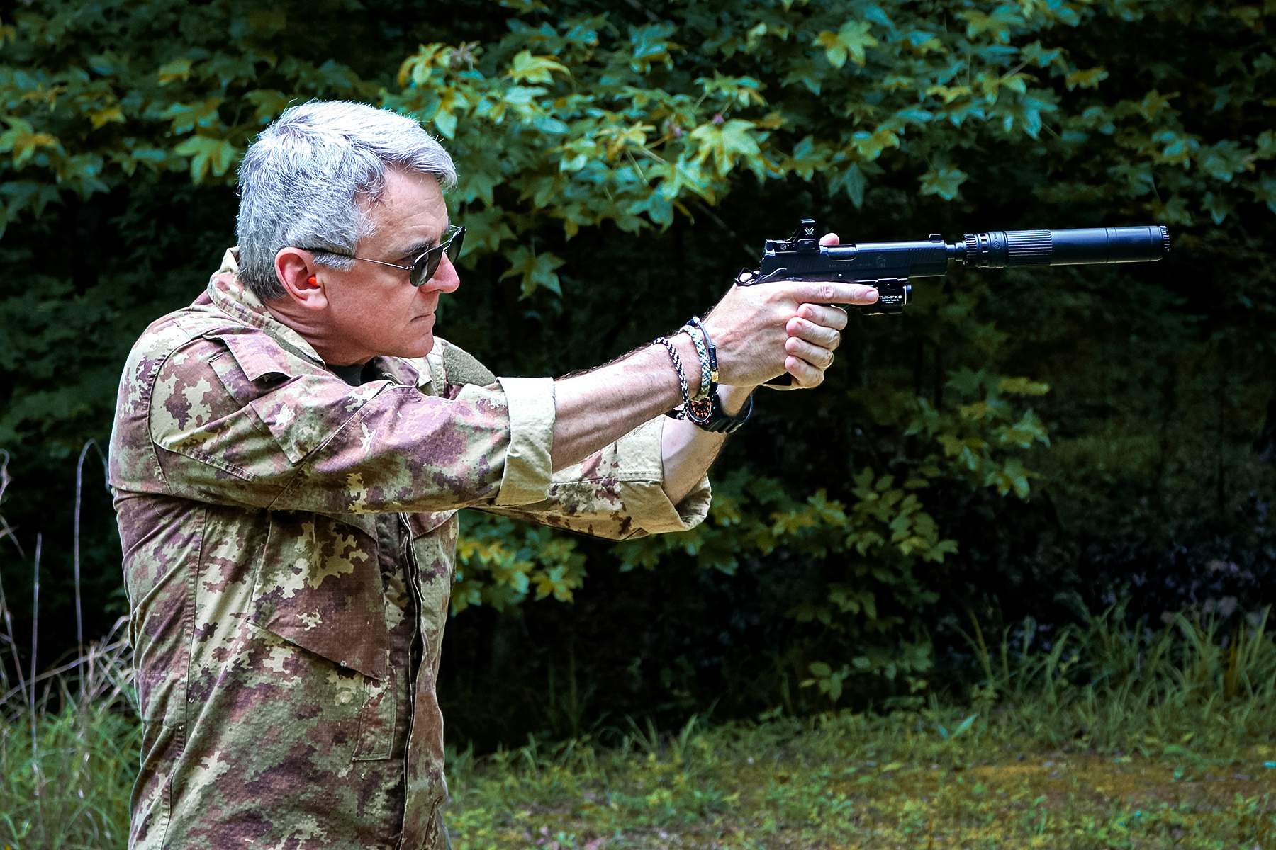 the author aiming the Springfield Operator and the dead air mojave 45 suppressor
