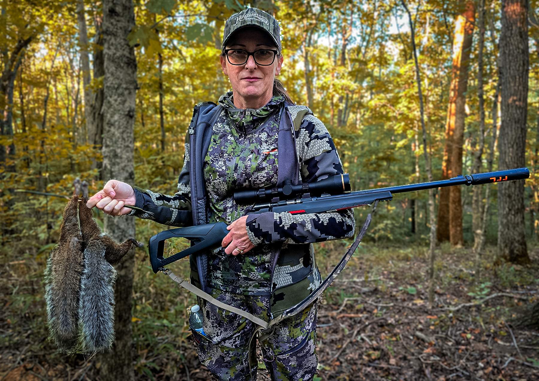 hunter with squirrels Winchester 21 Sharp