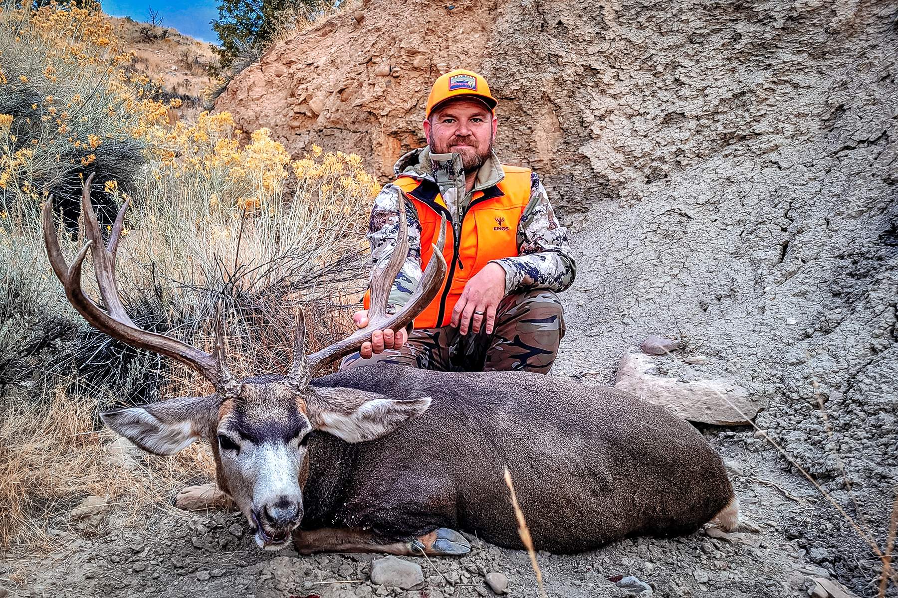 Barnes Harvest hunting ammunition hunter with a nice muley buck