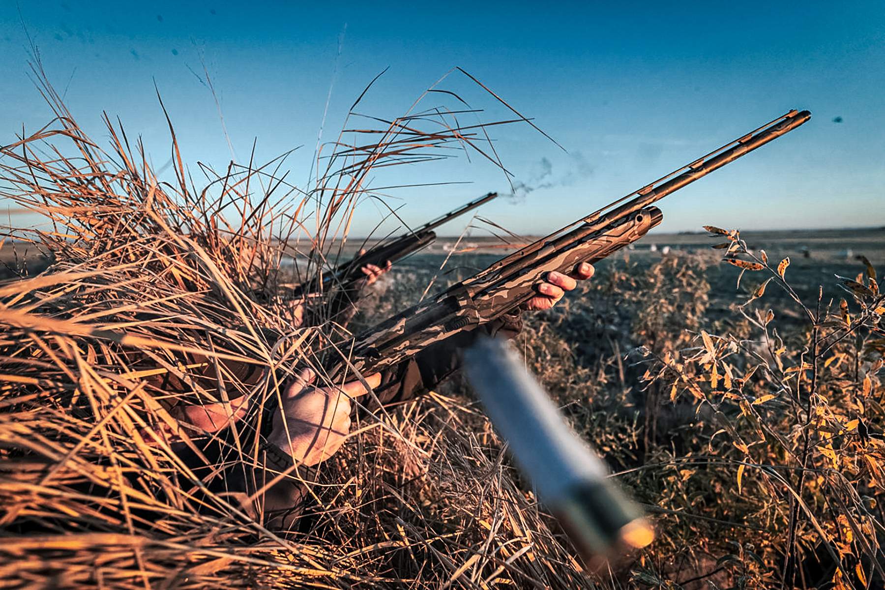 Beretta AX800 Suprema firing in a duck blind