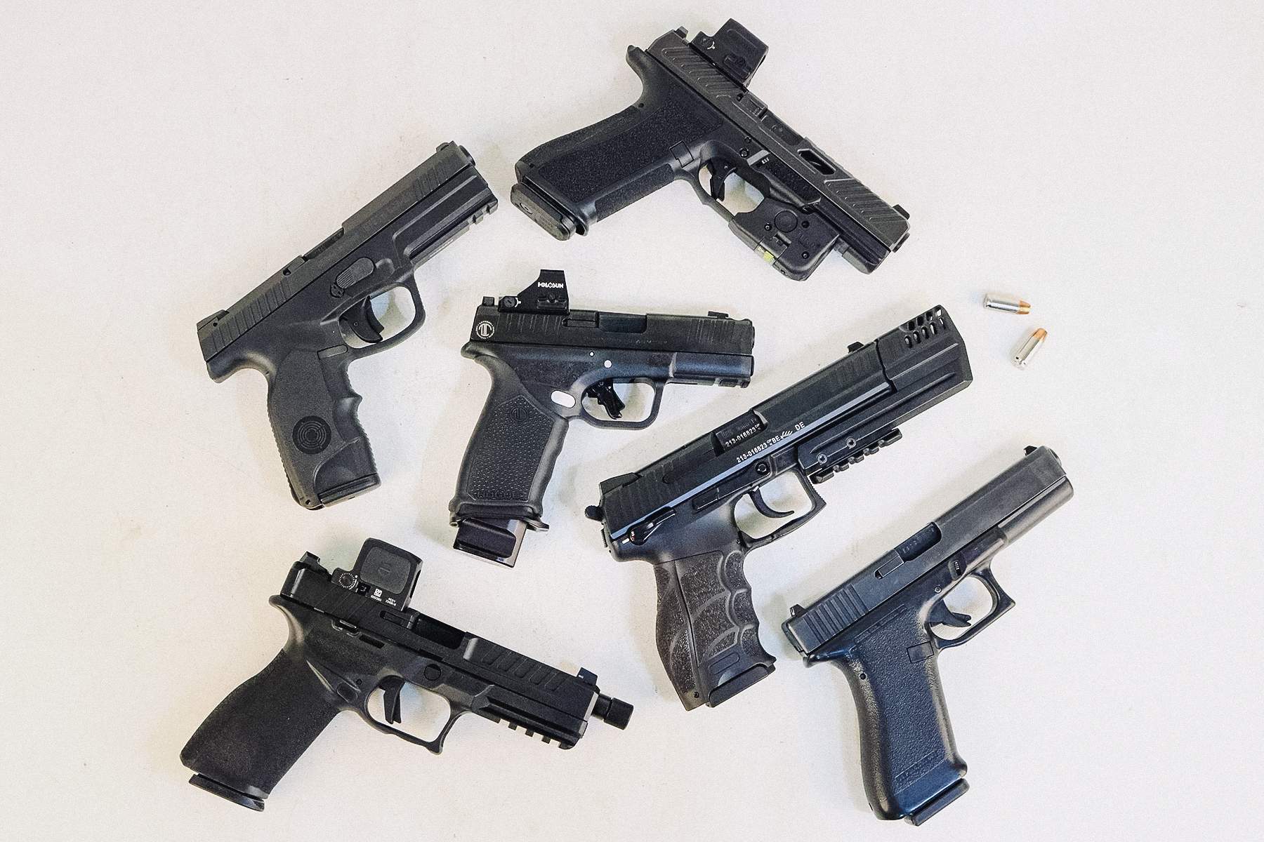 LTT Hellcat Pro with red dot with other handguns